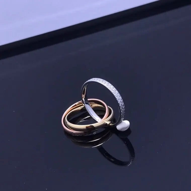 "Three rings, one spark of eternal love."