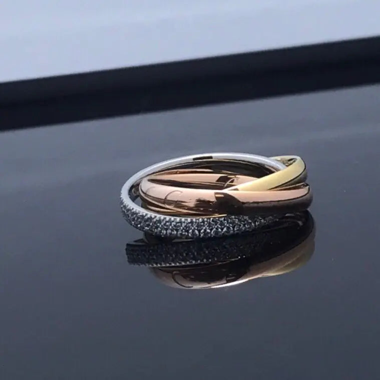 "Three rings, one spark of eternal love."